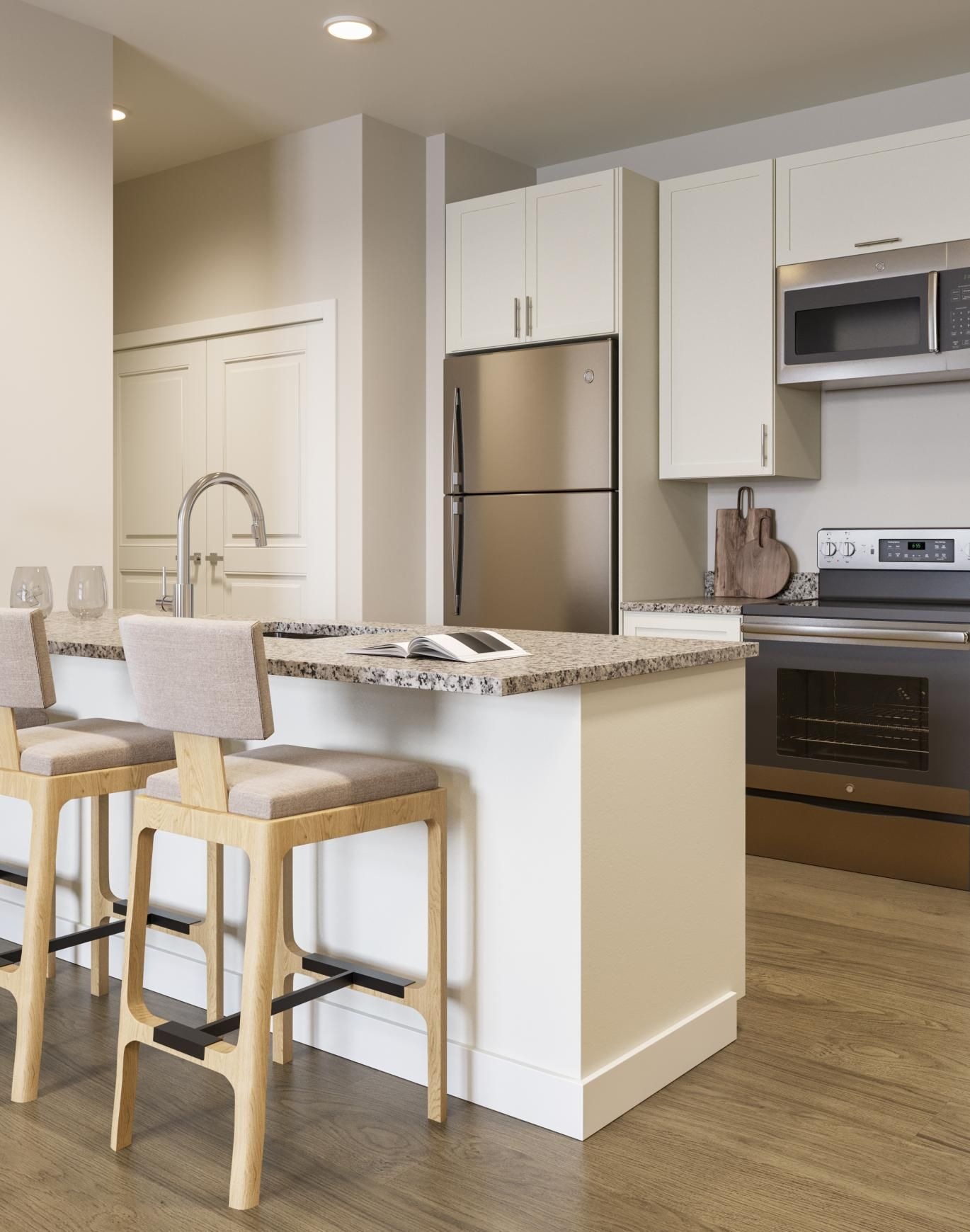a kitchen with white cabinets