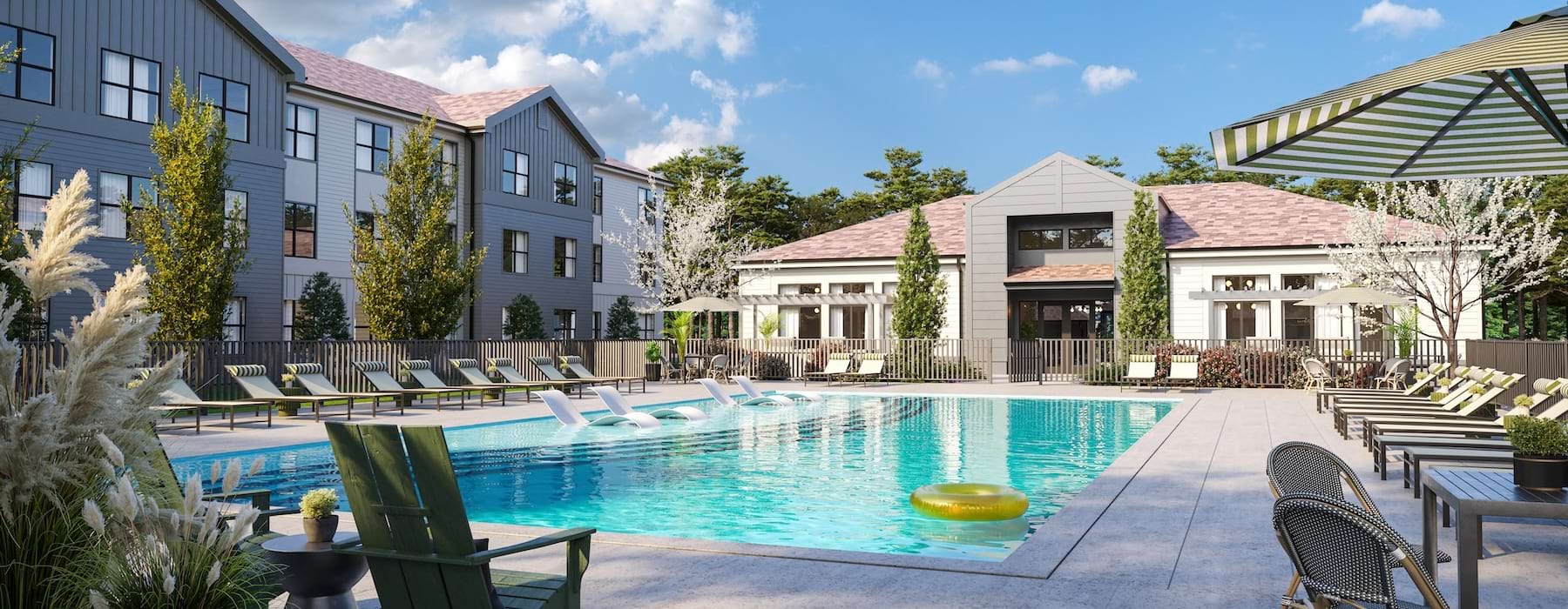 a swimming pool with chairs around it